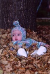 Mom threw me in the leaves.  5 months old.