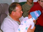 Grandpa telling Brandon about fishing.