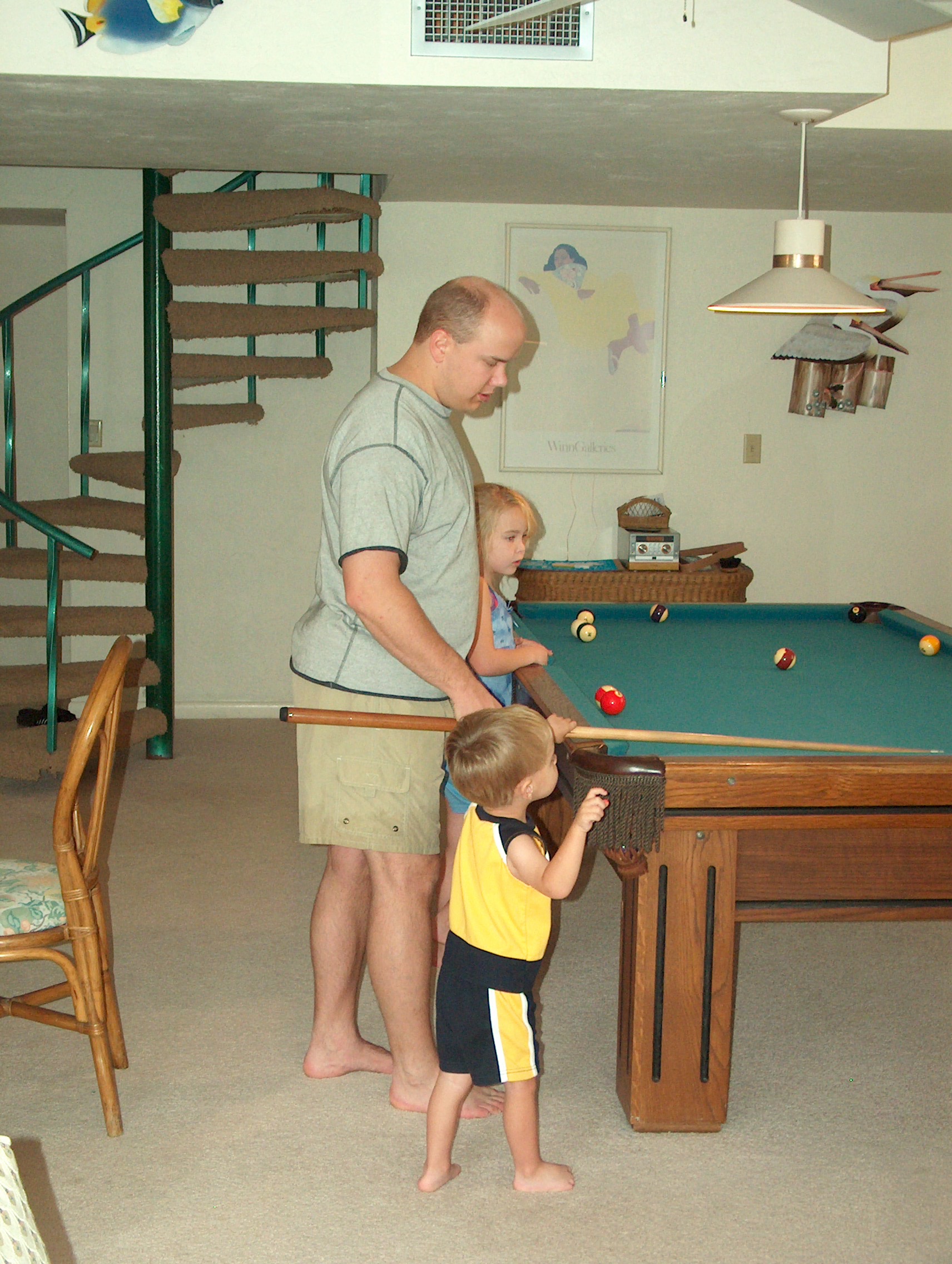 Brandon learning to play pool