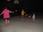 Grandma, Kayla and Brandon with sparklers