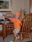 wearing his bandana from church and dusting