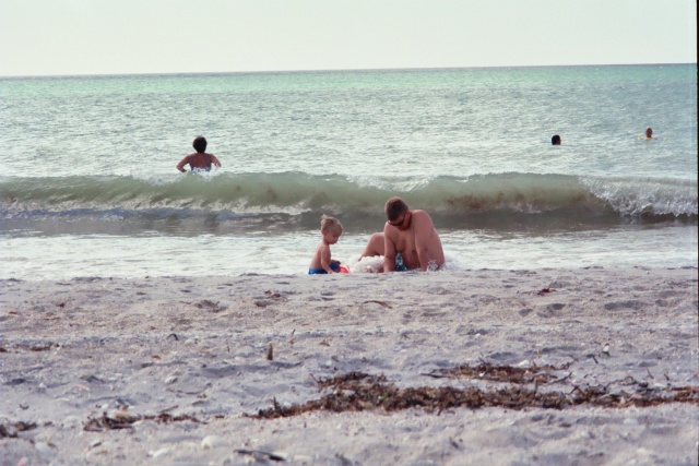 Brandon and Joe digging in the sand