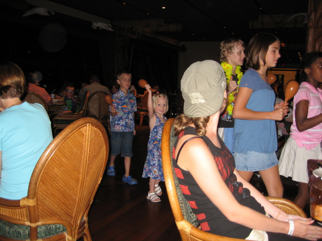 Doing the parade and limbo at Ohana's dinner at the Polynesian Resort