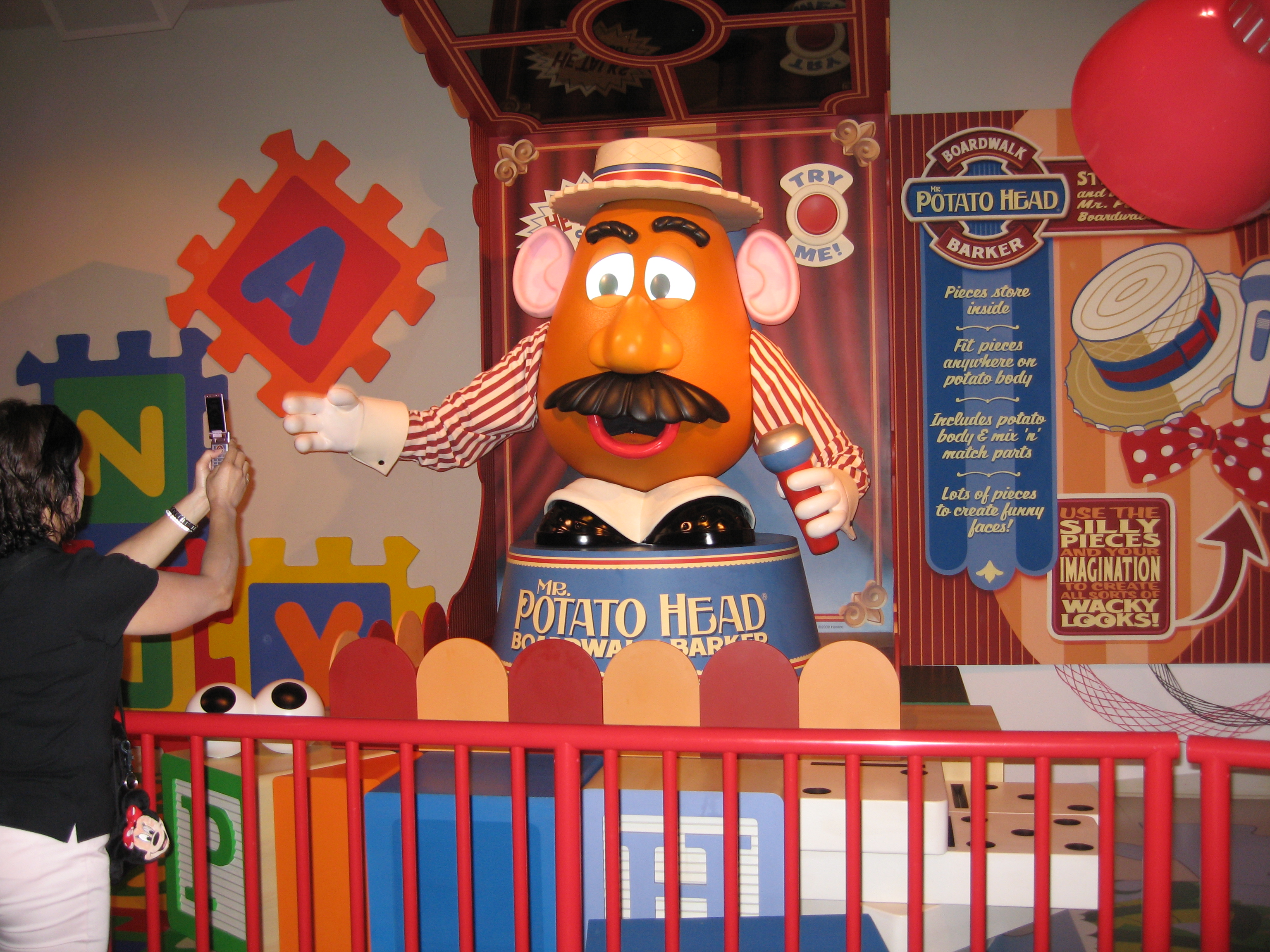 Mr Potato Head talks to everyone in the queu. Quite the jokester!