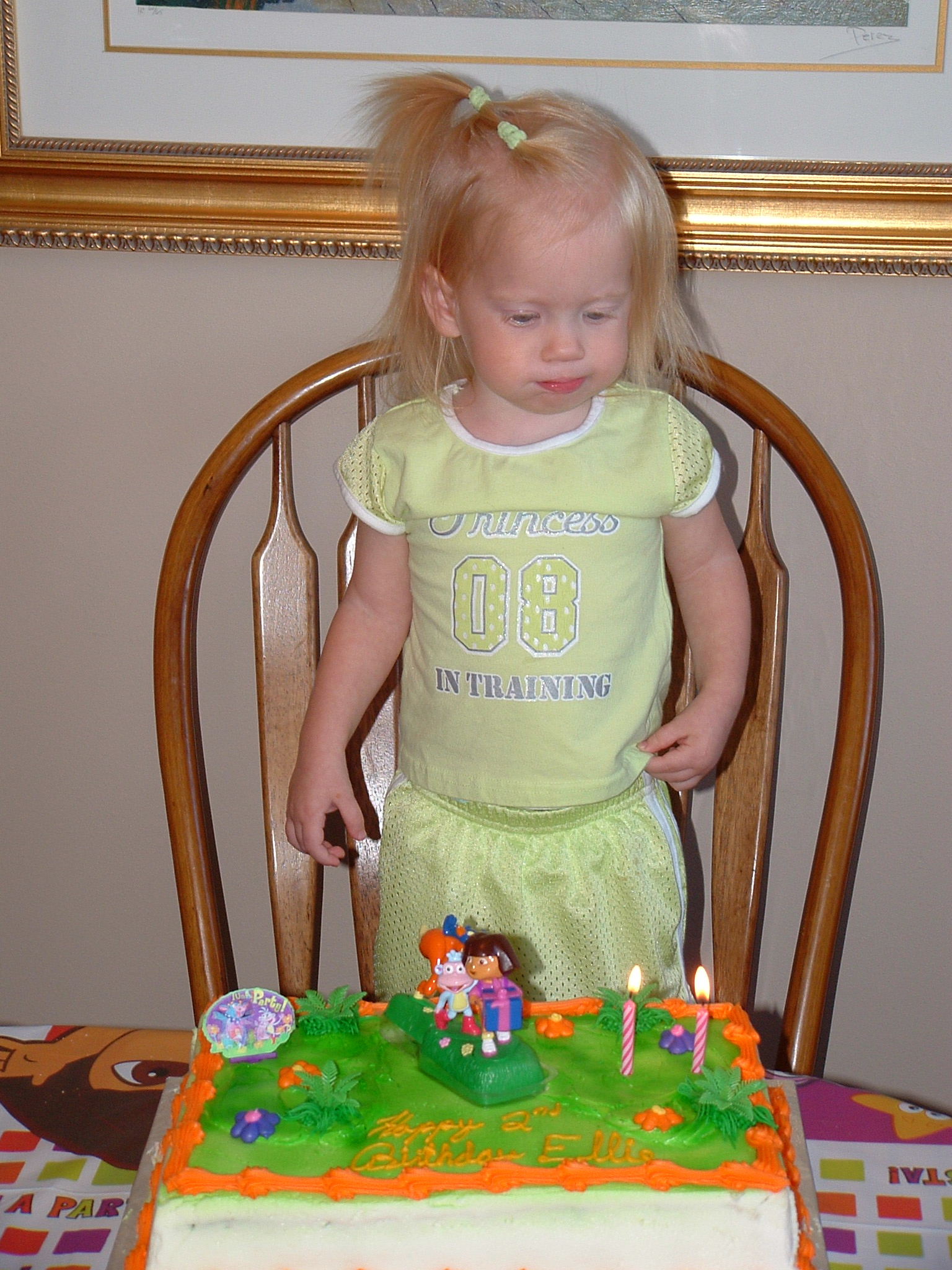 Trying to blow out the candles...but too far away!