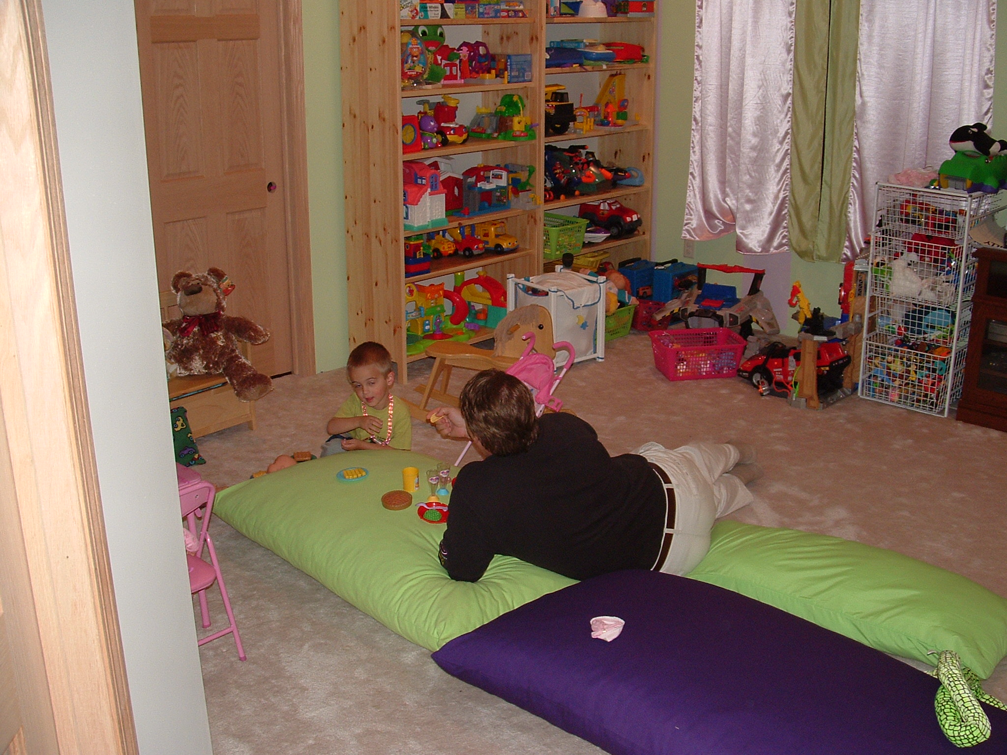 Having a 'picnic' in the playroom with Dad. May 10, 2005