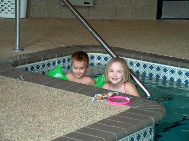 Brandon and Kayla swimming at the hotel