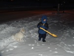 Brandon and Sophie shoveling snow